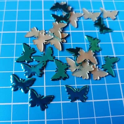 hotfix latas mariposas turquesa
