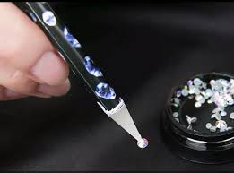 Lápiz de cera para colocar piedras strass
