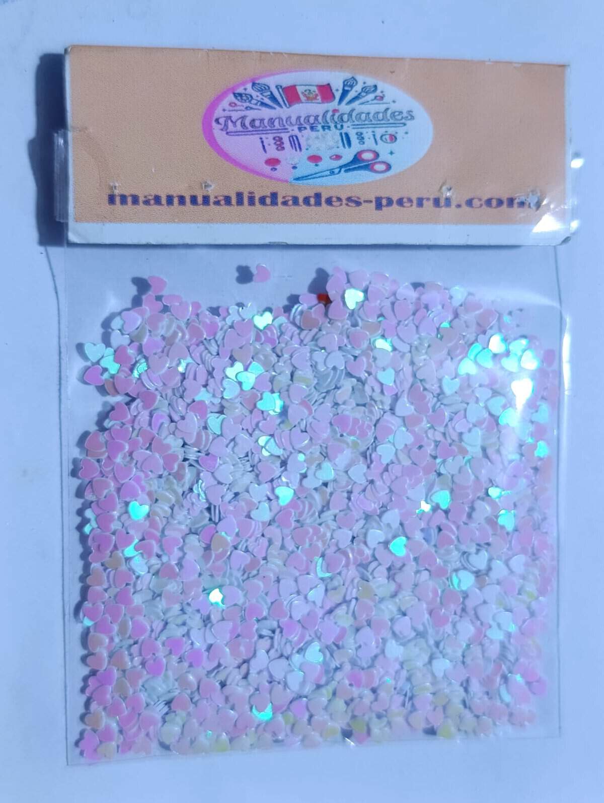 Modelo 14 lentejuelas corazones blanco tornasol